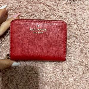red mini wallet for cards and change